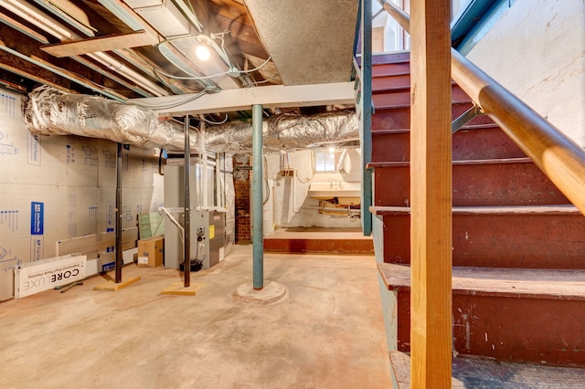 basement featuring heating unit