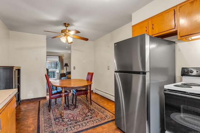 kitchen with white electric range, stainless steel refrigerator, ceiling fan, and a baseboard heating unit