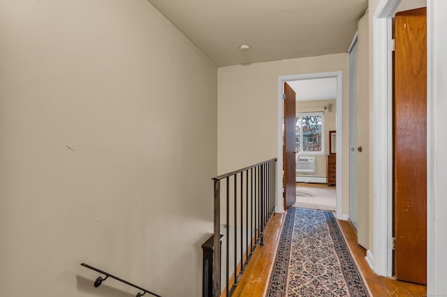 hall with light wood-type flooring