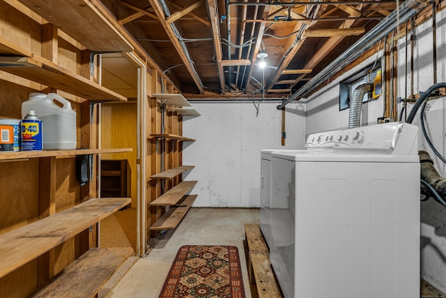 basement with washer and clothes dryer