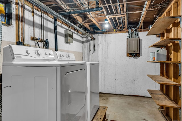 laundry room featuring separate washer and dryer and electric panel