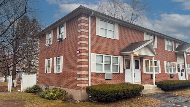 view of front of home featuring cooling unit