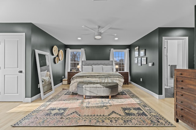 bedroom featuring ceiling fan and light hardwood / wood-style flooring