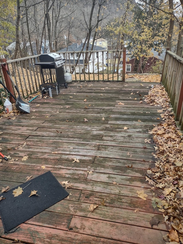 wooden deck with grilling area