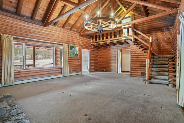 interior space with beamed ceiling, carpet flooring, wood ceiling, and high vaulted ceiling