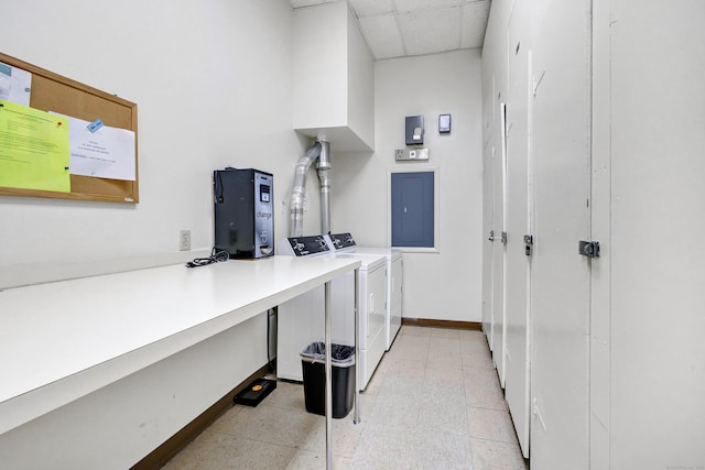 clothes washing area featuring washing machine and clothes dryer