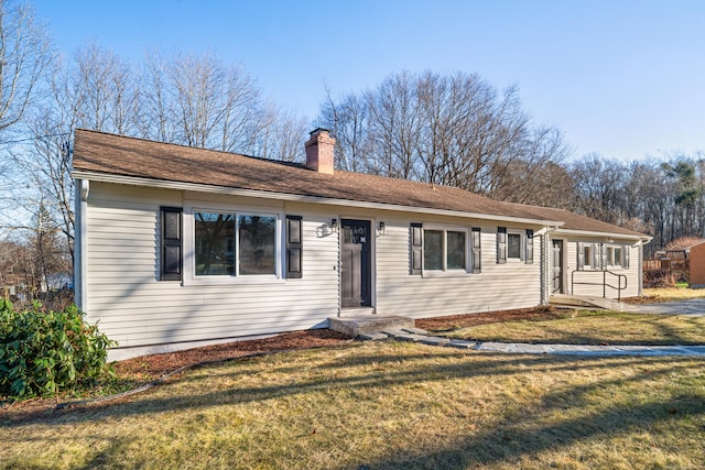 ranch-style house with a front yard