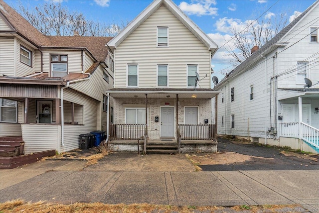 front facade featuring covered porch