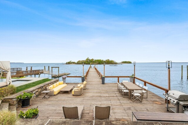 view of dock featuring a water view