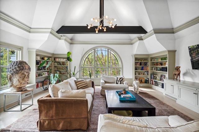 living room featuring vaulted ceiling with beams, a notable chandelier, a healthy amount of sunlight, and light hardwood / wood-style flooring