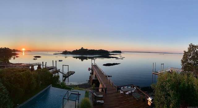 view of dock with a water view