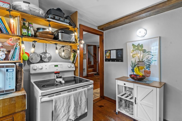 kitchen featuring dark hardwood / wood-style floors and white range with electric stovetop