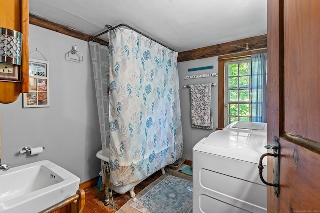 bathroom featuring washer / clothes dryer