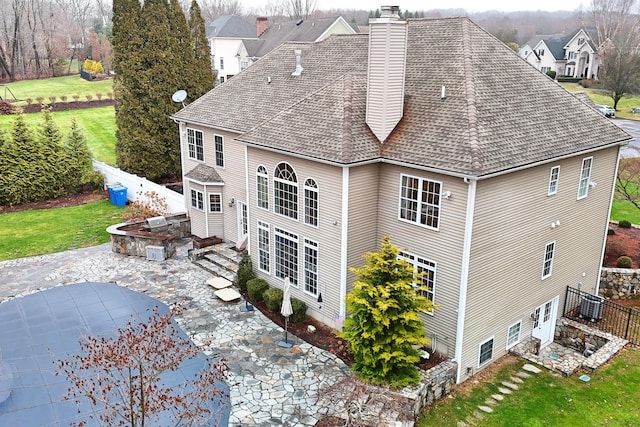 rear view of house featuring a patio area