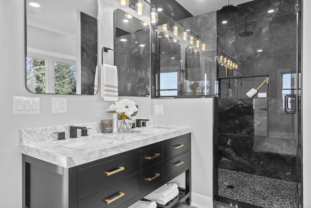 bathroom with vanity and walk in shower