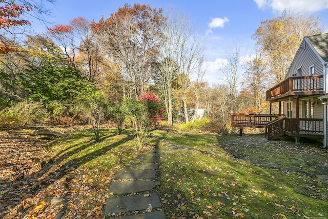 149 Chestnut Ridge Rd, Bethel, CT 06801 - view of green lawn with a deck
