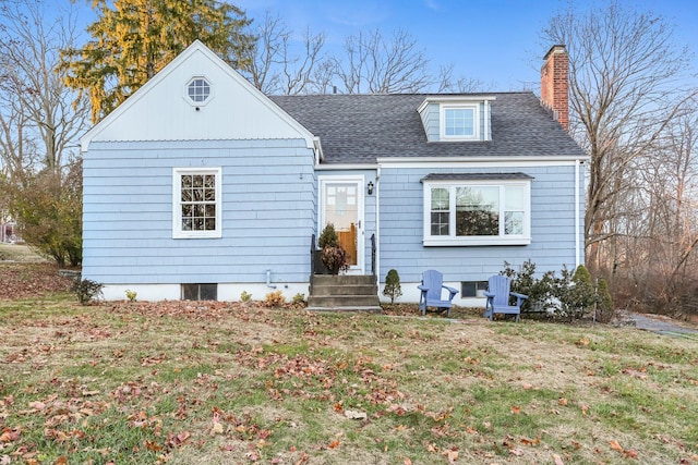 view of front facade with a front yard