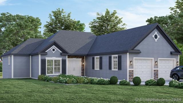 view of front facade featuring a front lawn and a garage