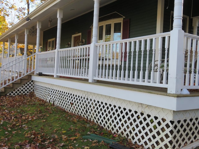 view of side of property featuring a porch