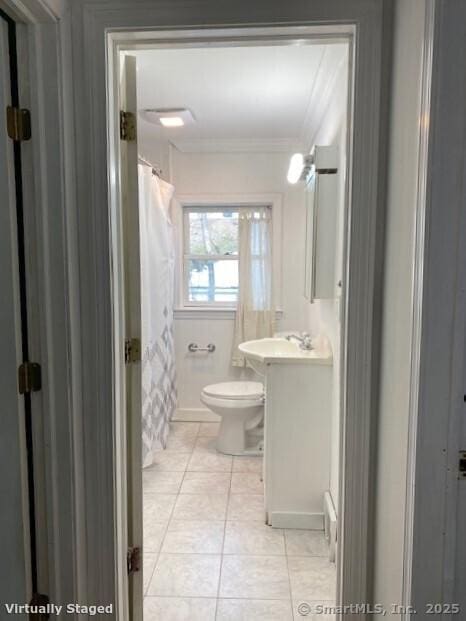 bathroom with vanity, ornamental molding, toilet, tile patterned floors, and a shower with shower curtain