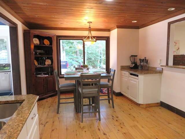 276 Parker Farms Rd, Wallingford, CT 06492 - dining area with ornamental molding, light wood-style floors, and wooden ceiling