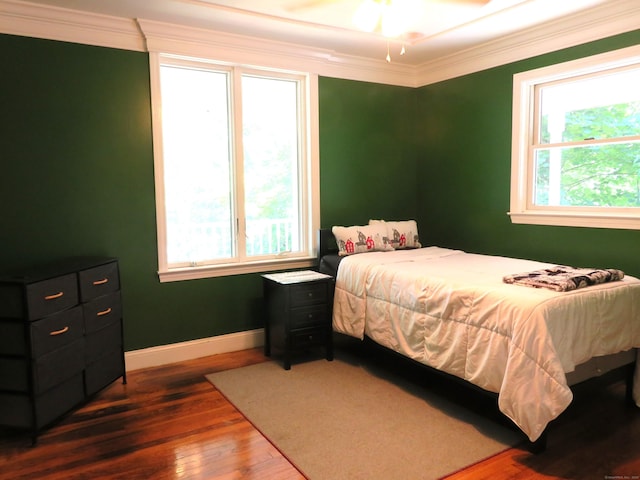 276 Parker Farms Rd, Wallingford, CT 06492 - bedroom with multiple windows, crown molding, and wood finished floors