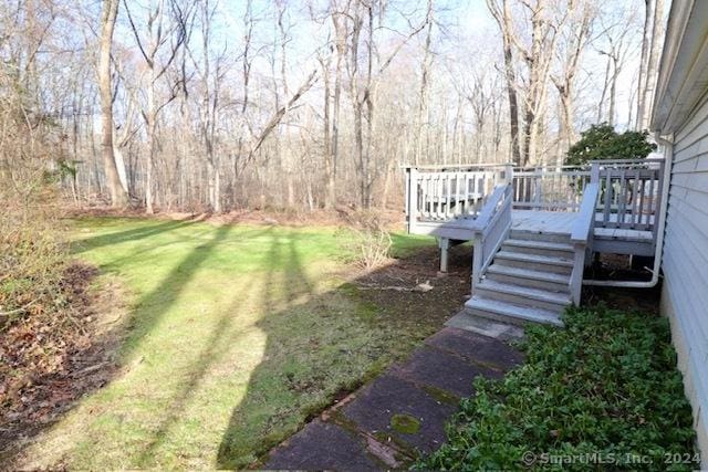 view of yard with a deck