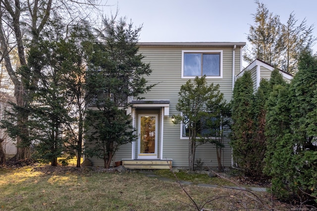 view of front of home with a front yard