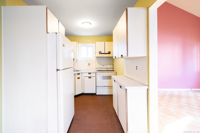 kitchen with white cabinets and white appliances