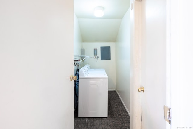 laundry room featuring separate washer and dryer and electric panel