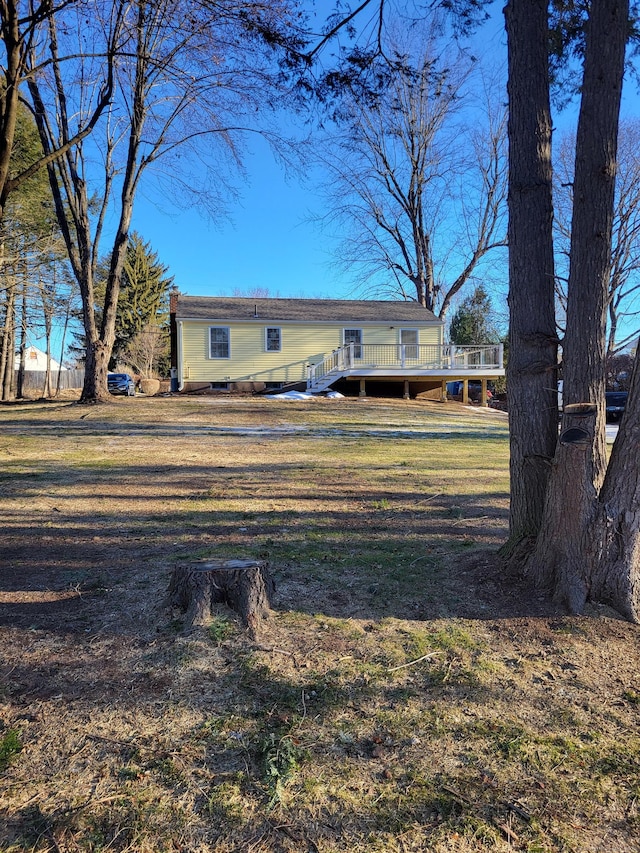 view of yard with a deck