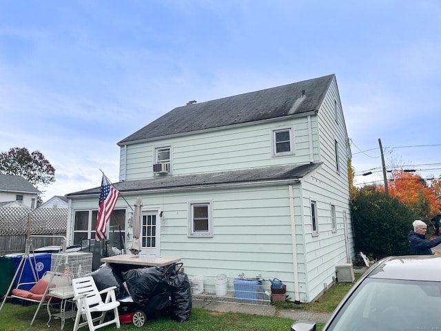 24 Brewster St, Stratford, CT 06614 - back of house with roof with shingles