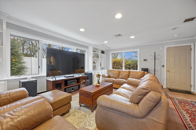 tiled living room with built in shelves and crown molding