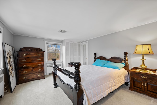 carpeted bedroom featuring radiator and crown molding