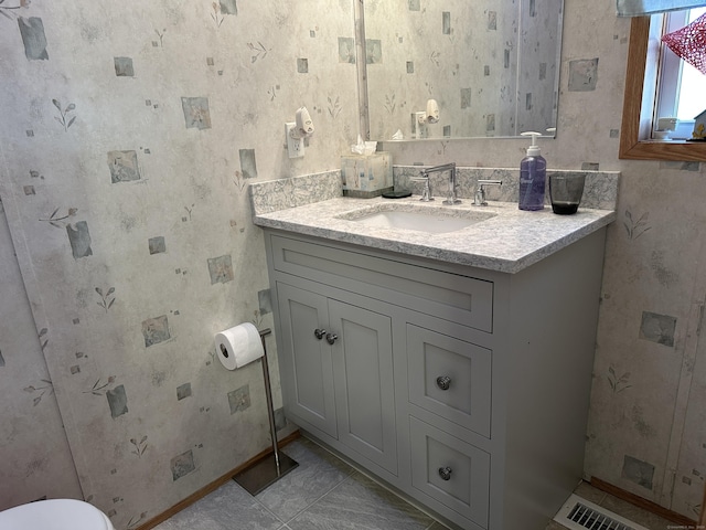 bathroom featuring vanity and tile patterned floors