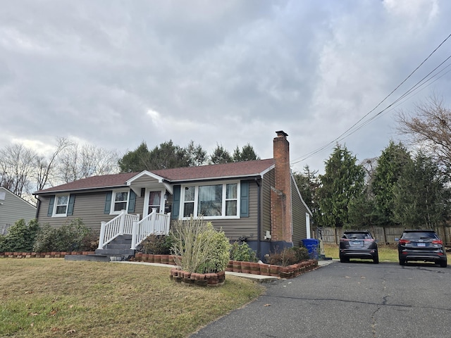 view of front of house with a front lawn