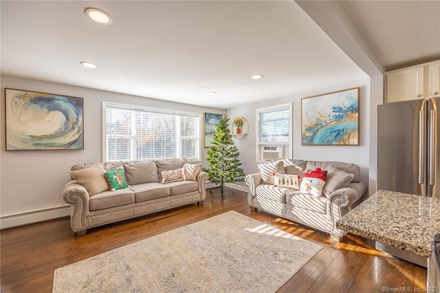 living area featuring a baseboard radiator, cooling unit, recessed lighting, dark wood-type flooring, and baseboards