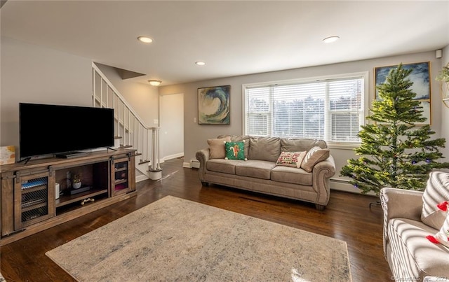 living area featuring dark wood-style floors, stairway, baseboards, and recessed lighting