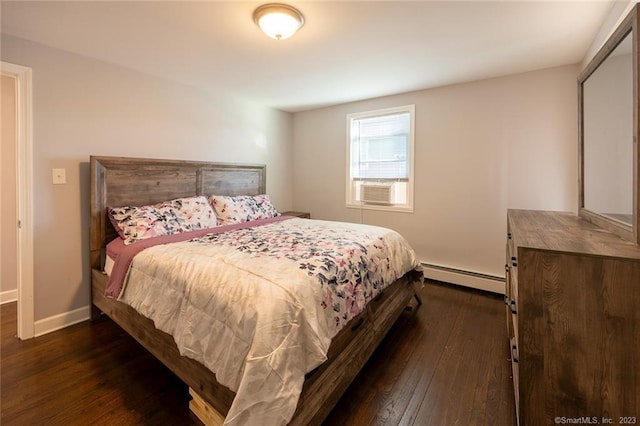 bedroom featuring baseboards, cooling unit, baseboard heating, and dark wood finished floors