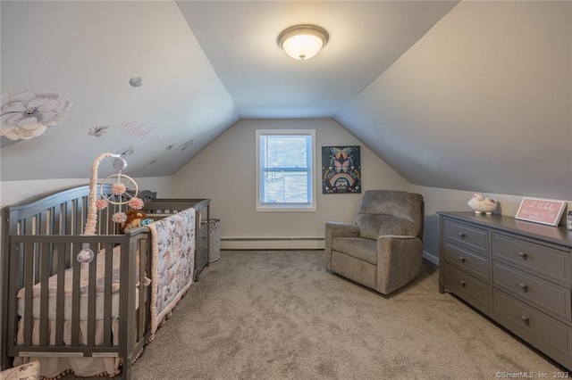 carpeted bedroom with vaulted ceiling, a crib, and baseboard heating