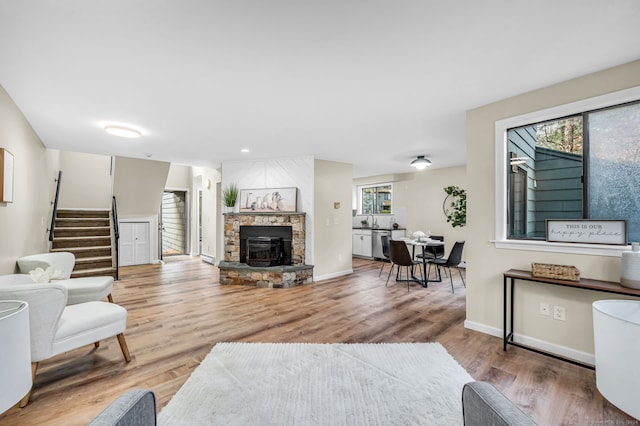 living room with hardwood / wood-style floors and a wealth of natural light