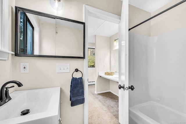 bathroom with vanity, a baseboard radiator, and  shower combination