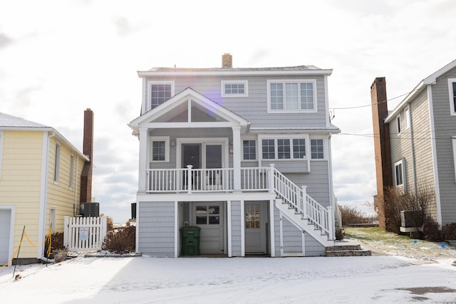 view of snow covered house