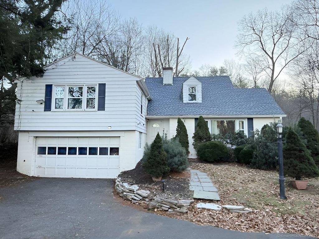 view of front of home with a garage