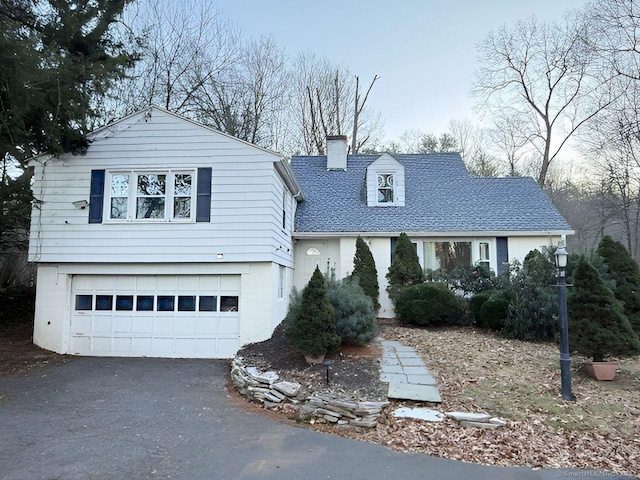 view of front of home with a garage