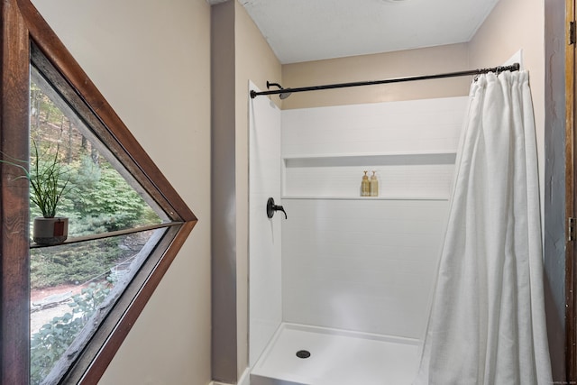 bathroom with curtained shower