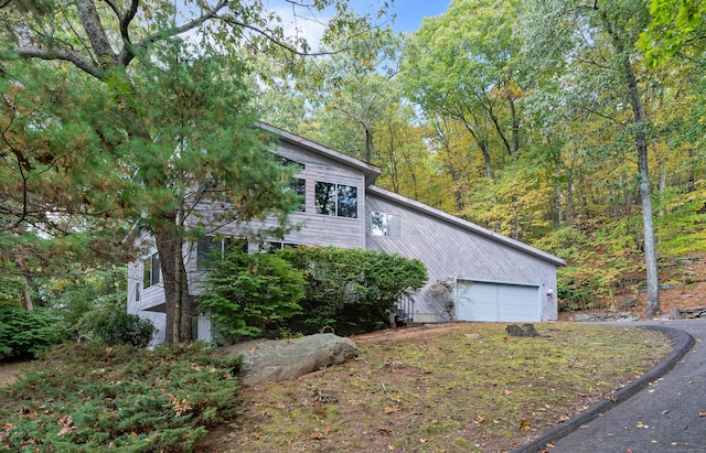 view of home's exterior with a garage