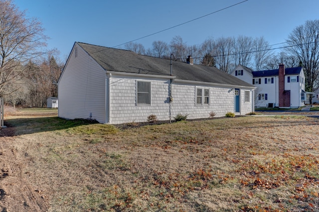 view of property exterior featuring a yard