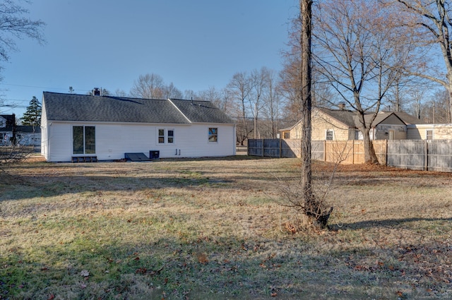 view of property exterior featuring a lawn