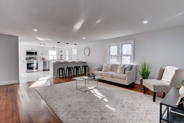 living room featuring light wood-type flooring